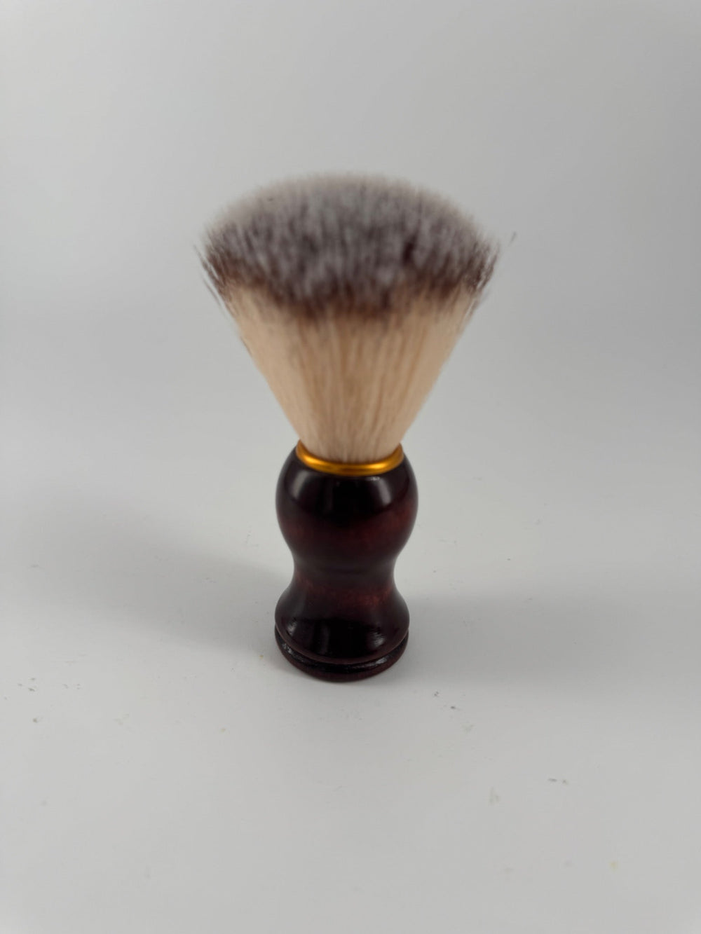 Wood handle synthetic shaving brush