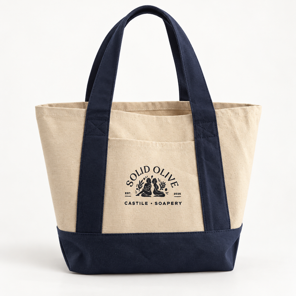 Solid Olive beige tote with navy straps and base, front pocket and printed logo