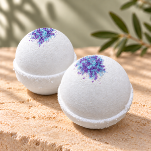 White Tangerine and Cedar bath bombs topped with mixed blue and purple sea salt.
